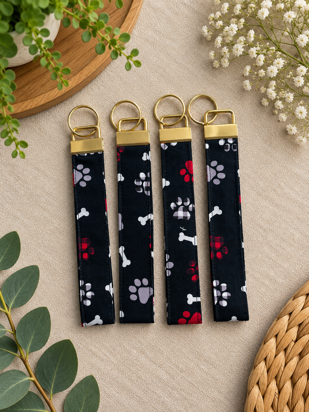 Red and black paws wristlet with gold clasp